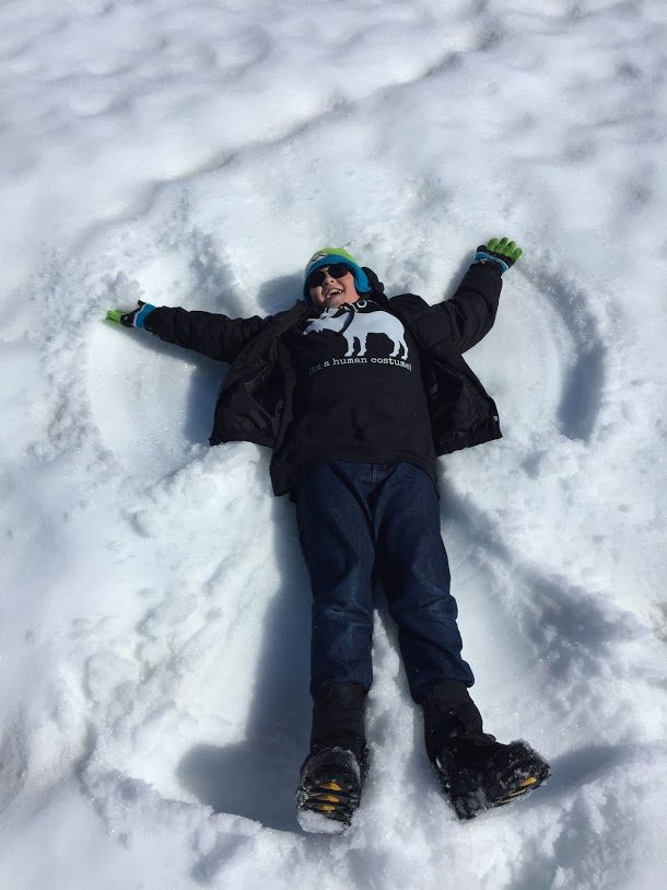 My son making a snow angel