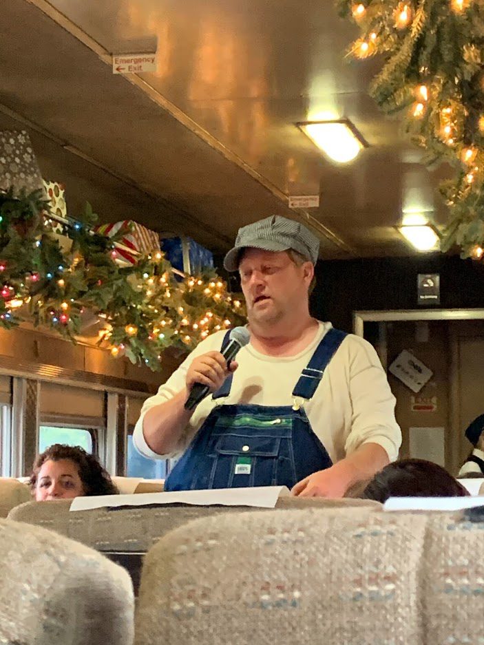 The actors on the Polar Express Train Ride performed using hand held microphones
