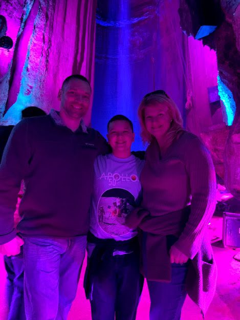 Our family standing in front of Ruby Falls