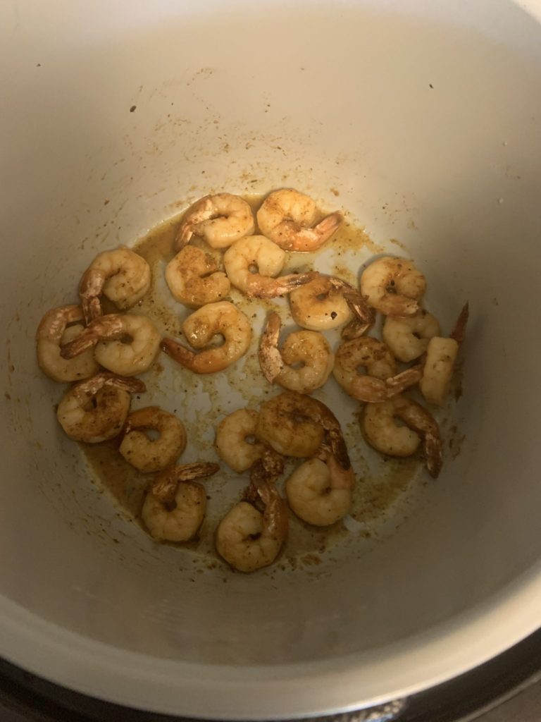 Sauté shrimp with Old Bay, Italian dressing seasoning packet, and butter for about 15 minutes