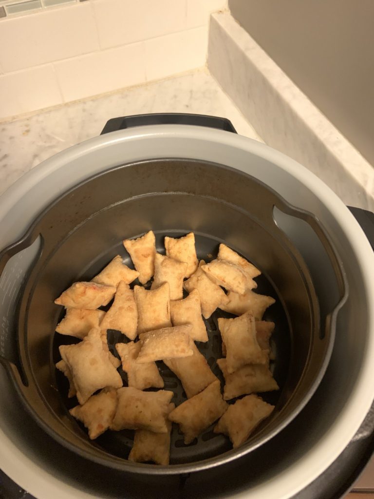 Dump the pizza rolls in the air fryer basket