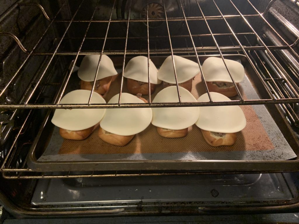 Place the subs into the oven to melt the cheese