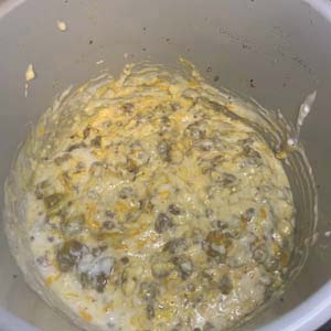 Add gravy to browned sausage and let saute' on low heat for 5-10 minutes