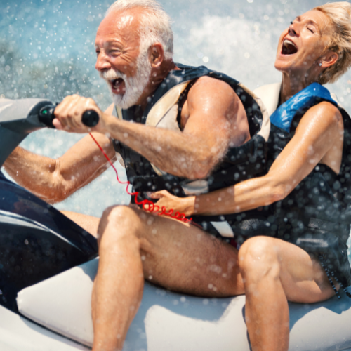 Man and woman having fun on a jet ski